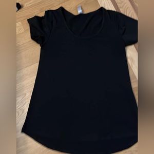 LuLaRoe black short sleeve swing type top. Size XXS